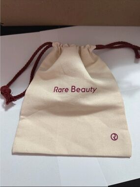 Rare Beauty Cream Drawstring Pouch with Plum Logo and Cords